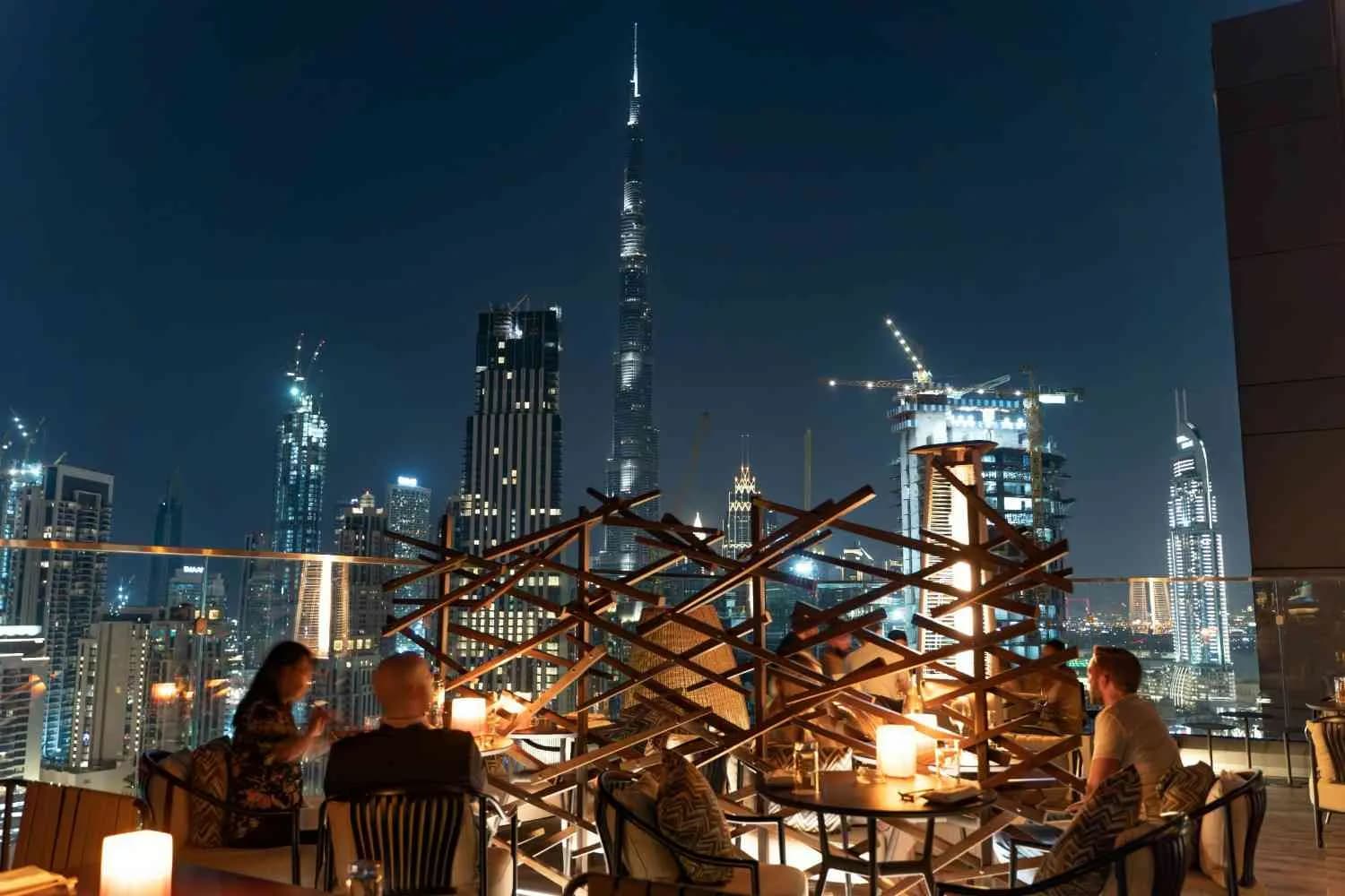 Dubai beach and evening city lights